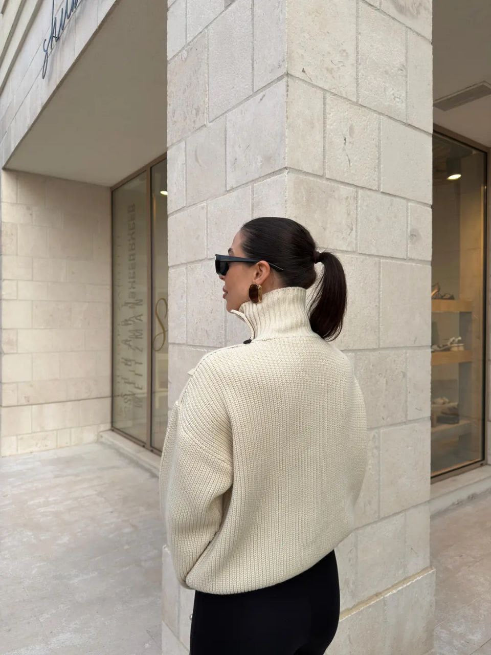 Buttoned High-Neck Knit Sweater